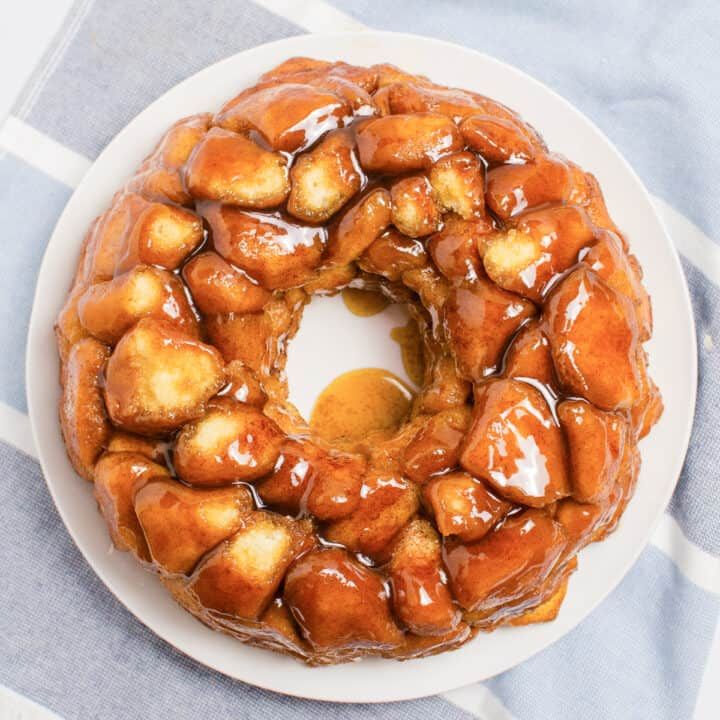Sticky sweet monkey bread with caramel sauce drizzled over the top